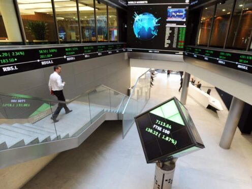File photo dated 04/10/16 of an electronic ticker tape showing the FTSE 100. (Nicholas T Ansell/PA)