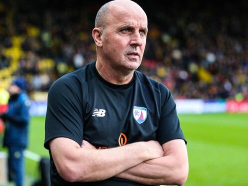 Paul Cook’s Chesterfield suffered a shock defeat in Surrey (Rhianna Chadwick/PA)