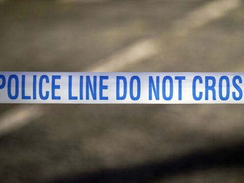 Stock image of police tape. (Peter Byrne/PA)