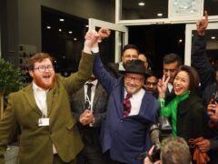 George Galloway holds a rally at his HQ after being declared winner of the Rochdale by-election (Peter Byrne/PA)