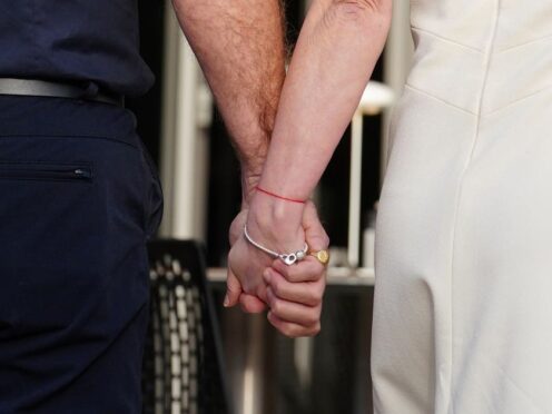Christian and Geri Horner holding hands before the Bahrain Grand Prix