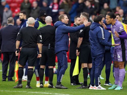 Referee Paul Tierney is surrouned by Nottingham Forest players and staff (Mike Egerton/PA).