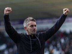 Ipswich manager Kieran McKenna celebrates in front of the fans at full-time (Steven Paston/PA)