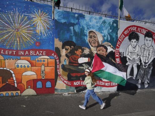 10-year-old Erin Corscadden at the unveiling of the International Wall in Belfast (Niall Carson/PA)