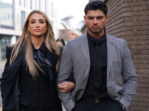 Georgia Harrison and Anton Danyluk arrive at Chelmsford Crown Court for Stephen Bear’s confiscation hearing (Lucy North/PA)