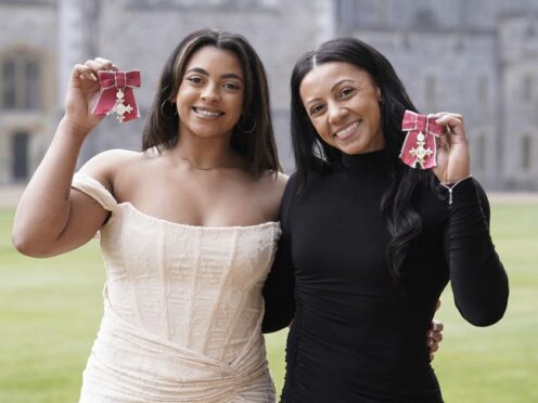 Elissa Downie (Ellie Downie, left) and Rebecca Downie (Becky Downie) after being made Members of the Order of the British Empire during an investiture ceremony at Windsor Castle (Andrew Matthews/PA)