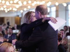 The Duke and Duchess of Edinburgh embrace (Danny Lawson/PA)