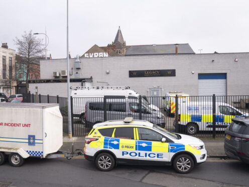 Police outside the Hessle Road branch of Legacy Independent Funeral Directors in Hull (Danny Lawson/PA)