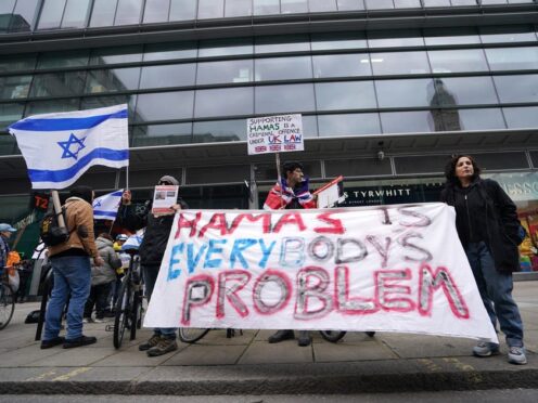 People at a counter-protest to the pro-Palestine marches, in Victoria, central London (Jordan Pettitt/PA)