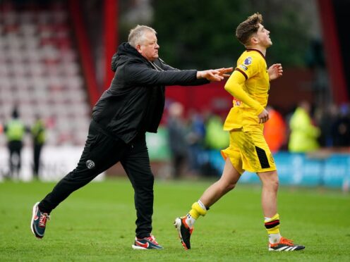 Sheffield United manager Chris Wilder pushes Oliver Arblaster towards the fans after the Premier League match at the Vitality Stadium, Bournemouth. Picture date: Saturday March 9, 2024.