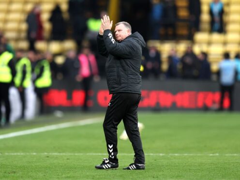 Coventry manager Mark Robins celebrates victory over Watford (Kieran Cleeves/PA).