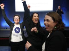People from the human rights and advocacy group The Countess celebrated at Dublin Castle as the result is announced in the first of the twin referenda to change the Constitution on family and care (Damien Storan/PA)