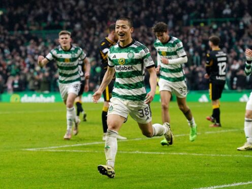 Daizen Maeda scored a hat-trick on his 100th Celtic appearance against Livingston (Andrew Milligan/PA)