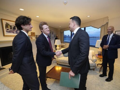 Taoiseach Leo Varadkar (centre) is greeted by Joe Kennedy III (second left) (Niall Carson/PA)