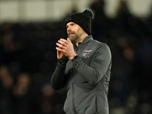 Paul Warne applauds the fans after his side’s win against Reading (Martin Rickett/PA)