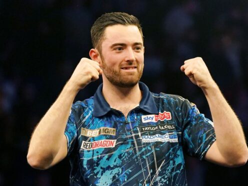 Luke Humphries celebrates victory over Nathan Aspinall on night seven of the 2024 BetMGM Premier League at the Motorpoint Arena, Nottingham. Picture date: Thursday March 14, 2024.
