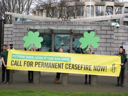Amnesty International Ireland activists demonstrate outside the US Embassy in Dublin urging President Joe Biden to call for a permanent ceasefire in Gaza. Picture date: Friday March 15, 2024.