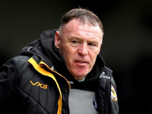 Newport County manager Graham Coughlan before the Sky Bet League Two match at the Cherry Red Records Stadium, London. Picture date: Saturday March 16, 2024.