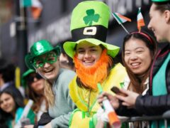 Crowds gathered to watch performers take part in the St Patrick’s Day Parade in Birmingham (Jacob King/PA)