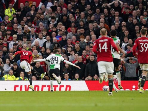 Amad Diallo, left, scored a late winner as Manchester United edged an FA Cup epic (Martin Rickett/PA)