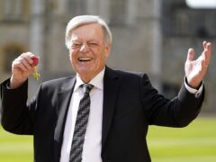 DJ Tony Blackburn was presented with his OBE for services to broadcasting and charity by the Princess Royal in an investiture ceremony at Windsor Castle (Andrew Matthews/PA)