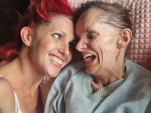 Elizabeth Taylor from Rochdale, who has neuroferritinopathy, with her daughter Penny (LifeArc/PA)