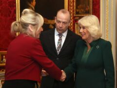 Queen Camilla (right) meets First Minister Michelle O’Neill (left) with Northern Ireland Secretary Chris Heaton-Harris (centre) as she attends an event hosted by the Queen’s Reading Room to mark World Poetry Day at Hillsborough Castle in Belfast, during her two-day official visit to Northern Ireland (Liam McBurney/PA)