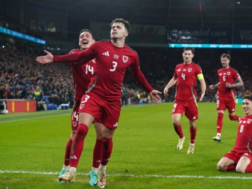 Neco Williams (second left) celebrates after scoring Wales’ second goal in their 4-1 Euro 2024 play-off victory over Finland (Nick Potts/PA)
