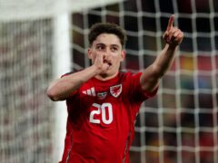 Daniel James celebrates after scoring Wales’ fourth goal in their Euro 2024 play-off semi-final victory over Finland (David Davies/PA)