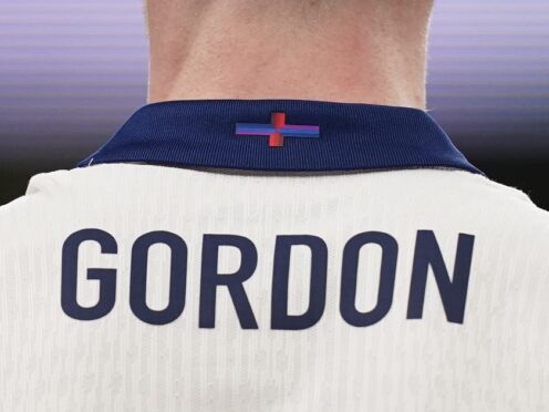 The St George’s Cross detail on the back of the shirt of England’s Anthony Gordon (PA)