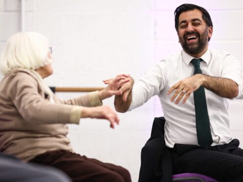 Humza Yousaf takes part in a dance performance during a visit to the Edinburgh Community Performing Arts’ re-connect project (Jeff J Mitchell/PA)