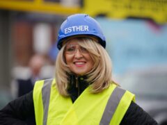 Minister without Portfolio Esther McVey helps repairs potholes in Leigh in Greater Manchester, as she called for councils to “get on with it” and use the �8.3bn allotted to councils to fix potholes. Picture date: Monday March 25, 2024.