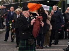 The coffin of veteran republican Rose Dugdale is carried to the Crematorium Chapel in Glasnevin, Dublin (PA)