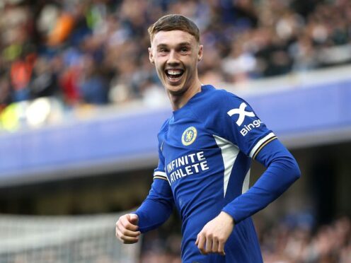 Chelsea’s Cole Palmer celebrates scoring their side’s first goal of the game from the penalty spot during the Premier League match at Stamford Bridge, London. Picture date: Saturday March 30, 2024.