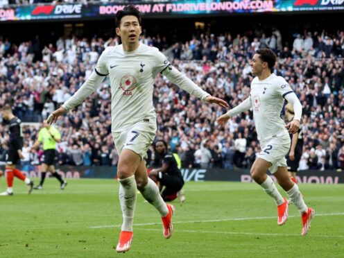 Son Heung-Min celebrates scoring Tottenham’s winner against Luton (Steven Paston/PA)