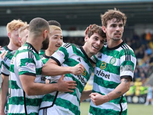 Celtic celebrate Paulo Bernardo’s goal against Livingston (Steve Welsh/PA)
