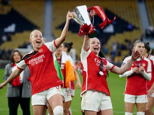 Arsenal’s Beth Mead (left) and Kim Little lift the Continental Tyres League Cup trophy following victory during the FA Women’s Continental Tyres League Cup Final at Molineux Stadium, Wolverhampton. Picture date: Sunday March 31, 2024.