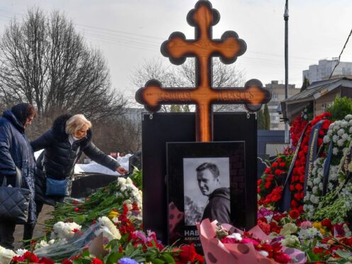 Alexei Navalny was buried after a funeral that drew thousands of mourners (AP)