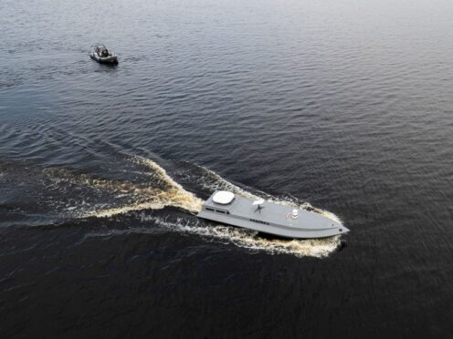 A sea drone cruises on the water during a presentation by Ukraine’s Security Service (Evgeniy Maloletka/AP)