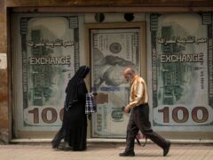 The Egyptian pound slipped sharply against the dollar after the Central Bank of Egypt raised its main interest rate and said it would allow the currency’s exchange rate to be set by market forces (AP)