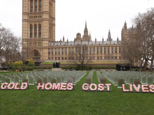 Greenpeace activists turned a royal park outside the Houses of Parliament into a cemetery warning the Government that its failure to insulate people’s homes is costing lives (Alex McBride/Greenpeace/PA)