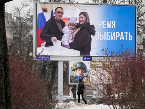 Billboards promoting the upcoming presidential election with the words in Russian ‘Time to vote’ in St. Petersburg, Russia (AP Photo/Dmitri Lovetsky, File)