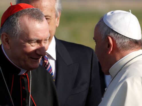 Pope Francis greets Vatican Secretary of State Monsignor Pietro Parolin (Riccardo De Luca/AP)