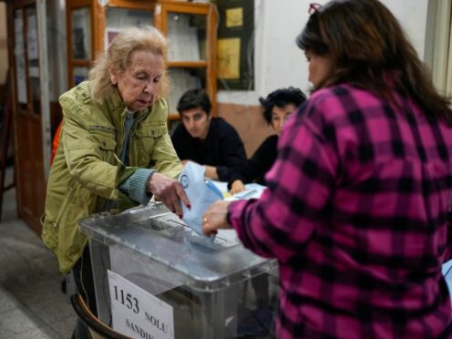 A woman votes at a polling station in Istanbul (AP Photo/Emrah Gurel)