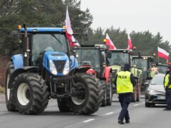 Polish farmers blocked major roads with tractors during the protest (AP)