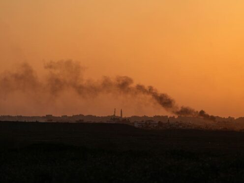 Smoke rises following an explosion in the Gaza Strip (Ohad Zwigenberg/AP)
