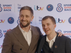 England cricketer Chris Woakes smiles with award winner Connor Hyde (ITV/PA)