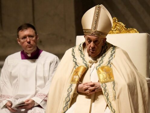Pope Francis presides over the Easter vigil celebration in St Peter’s Basilica (Alessandra Tarantino/AP/PA)