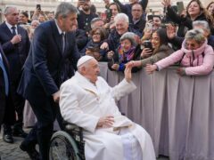 Pope Francis greeted people as he left his weekly general audience in St Peter’s Square at the Vatican (AP)
