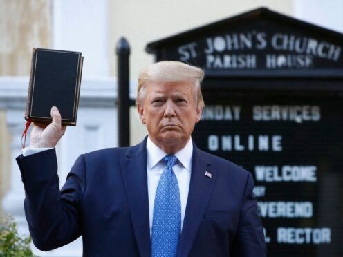 Former president Donald Trump holds a Bible (Patrick Semansky/AP)